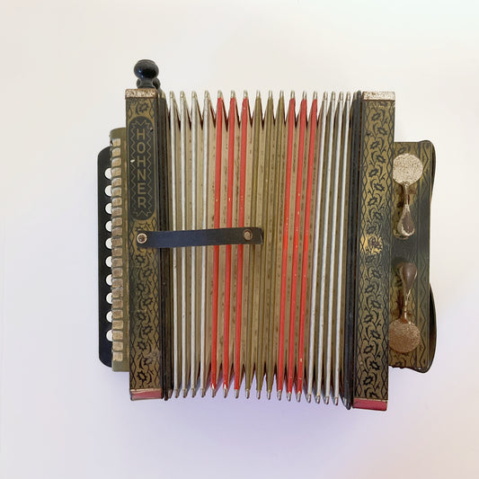 Black Hohner HA-114 Diatonic Button Accordion