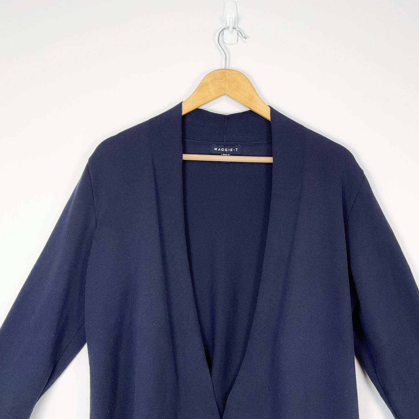 MAGGIE T - Navy Long Sleeve Cardigan with Metal Eyelets in Bottom