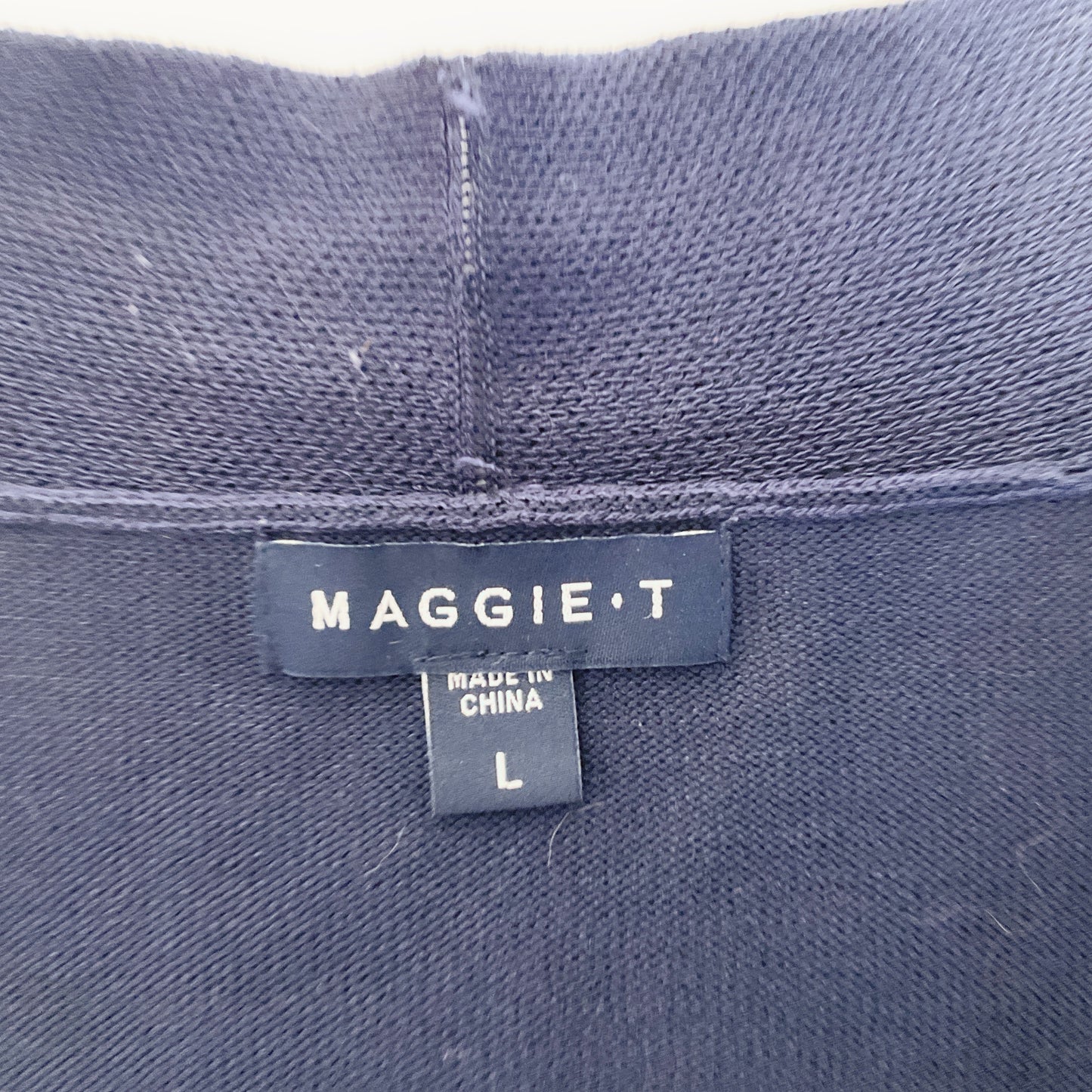 MAGGIE T - Navy Long Sleeve Cardigan with Metal Eyelets in Bottom