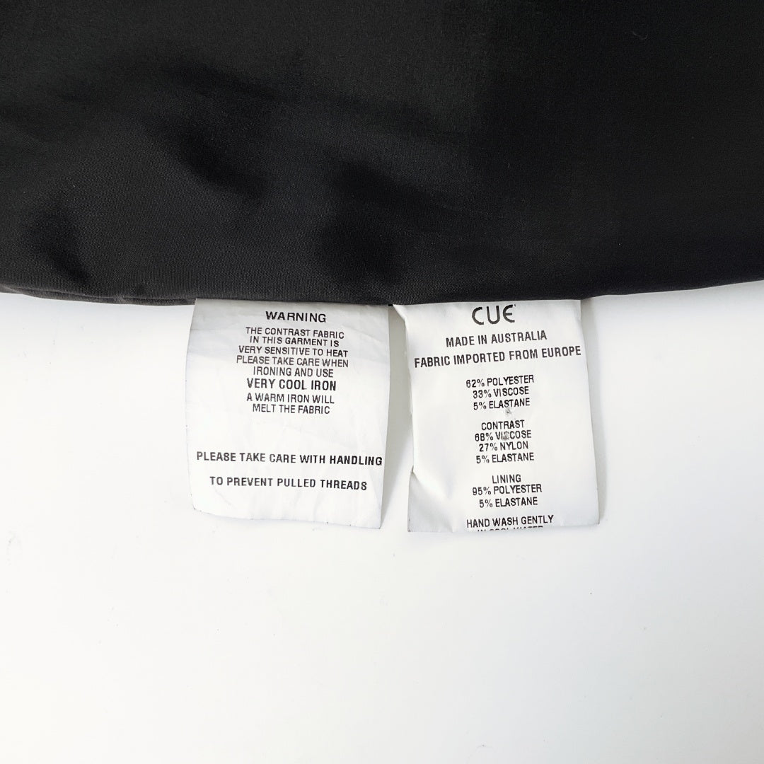 CUE - Midi Pencil Skirt in Black Plaid Design