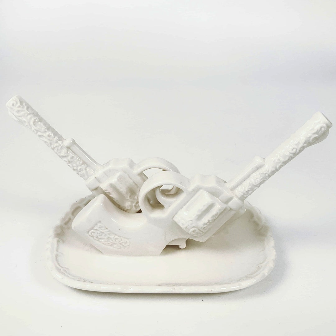 IMM Living - Crossed Revolvers on a Decorative Base