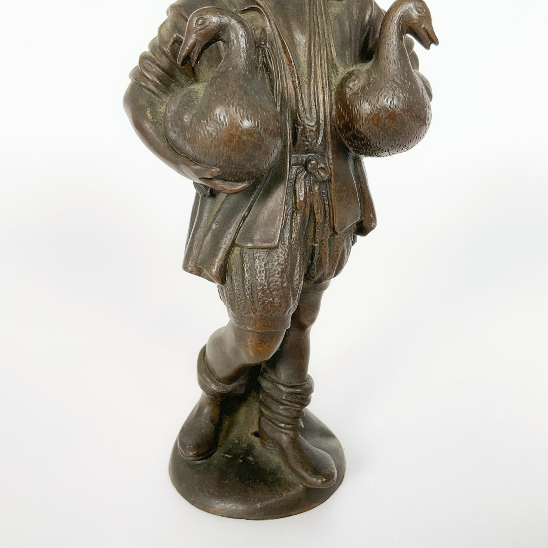 Vintage Figurine - Man Carrying Two Geese