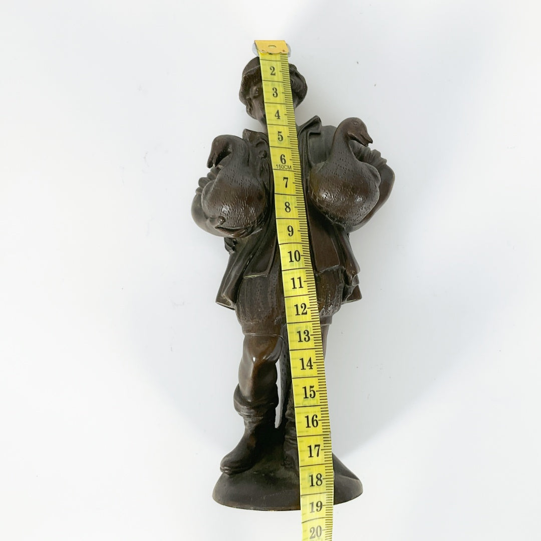 Vintage Figurine - Man Carrying Two Geese