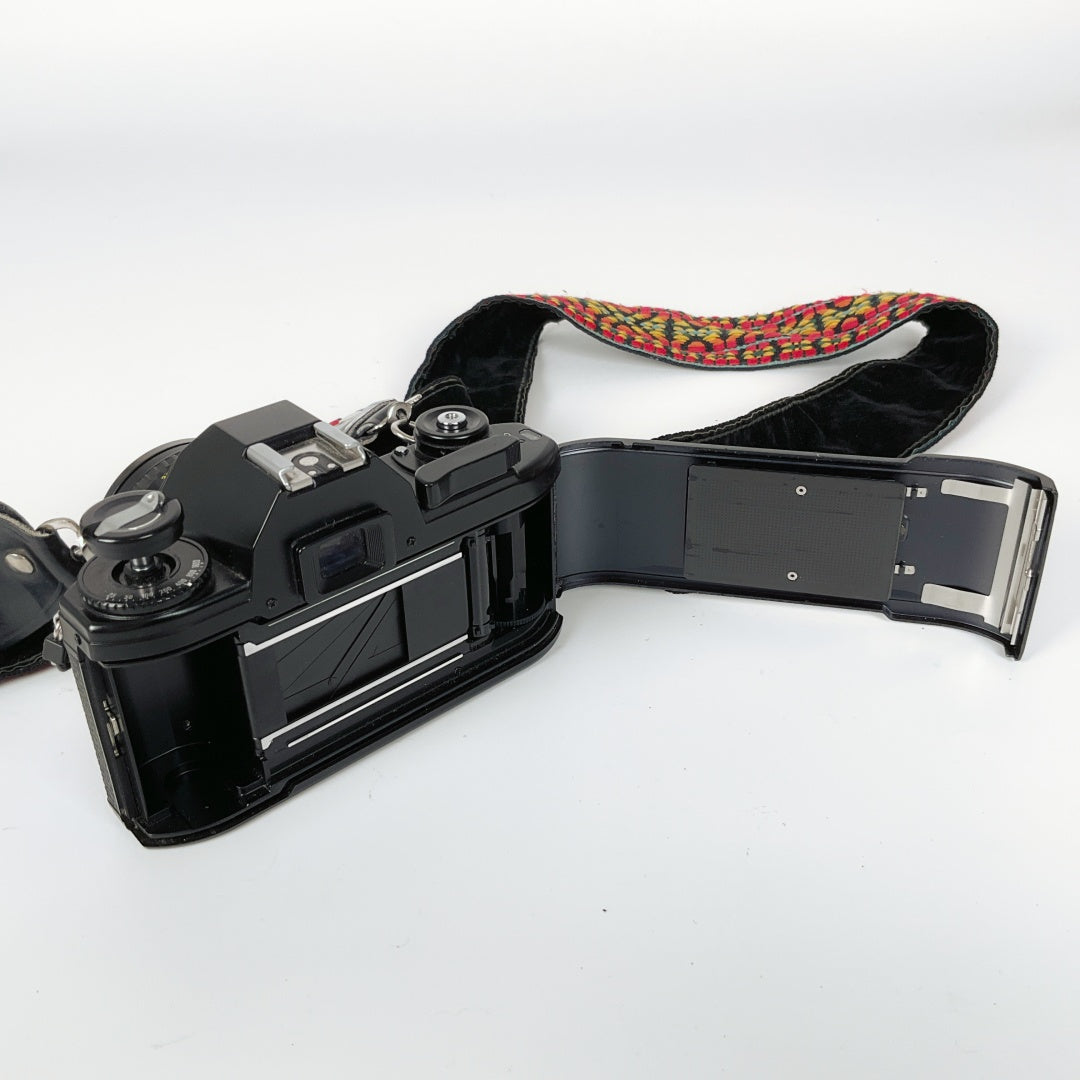 Nikon EM 35mm Film Camera + Nikon Series E 50mm f/1.8 Lens