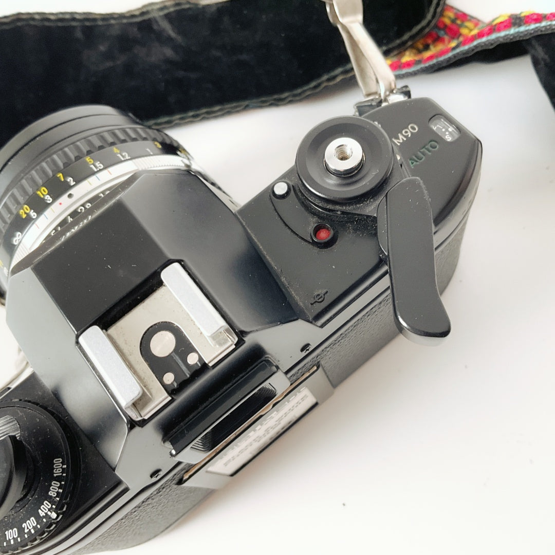 Nikon EM 35mm Film Camera + Nikon Series E 50mm f/1.8 Lens