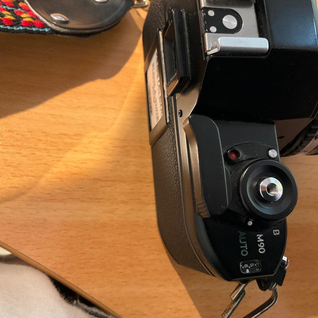 Nikon EM 35mm Film Camera + Nikon Series E 50mm f/1.8 Lens