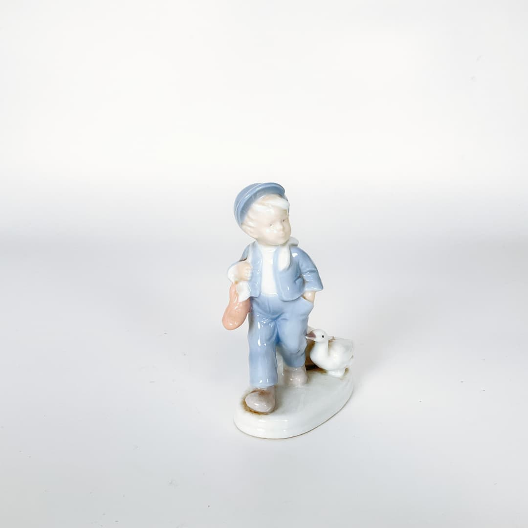 Porcelain Boy with Goose Figurine
