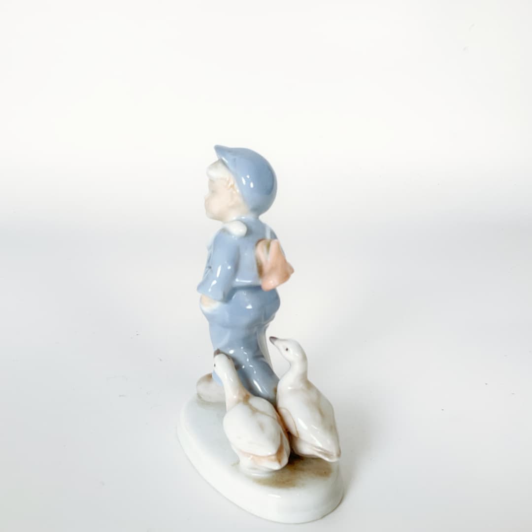 Porcelain Boy with Goose Figurine