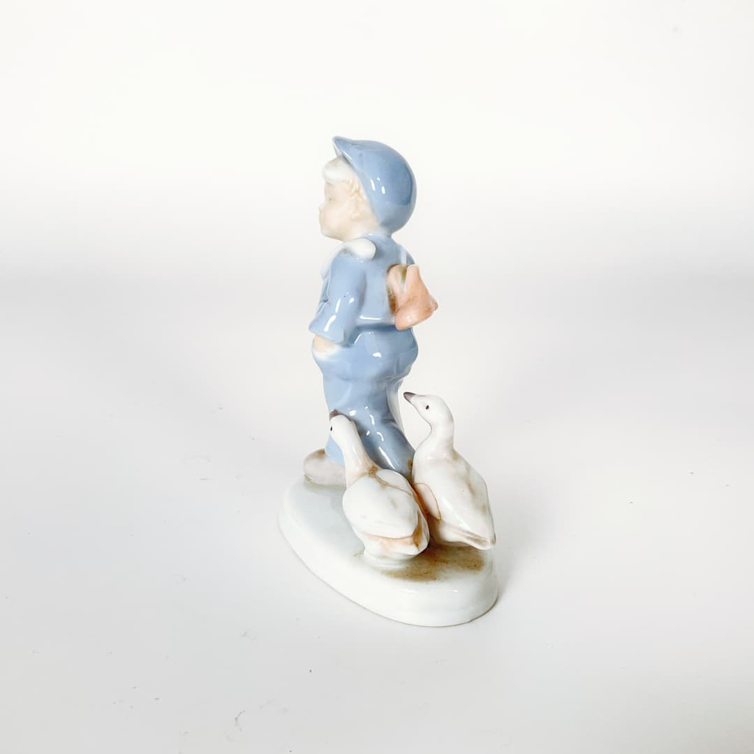 Porcelain Boy with Goose Figurine