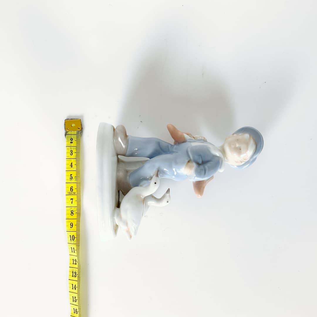 Porcelain Boy with Goose Figurine