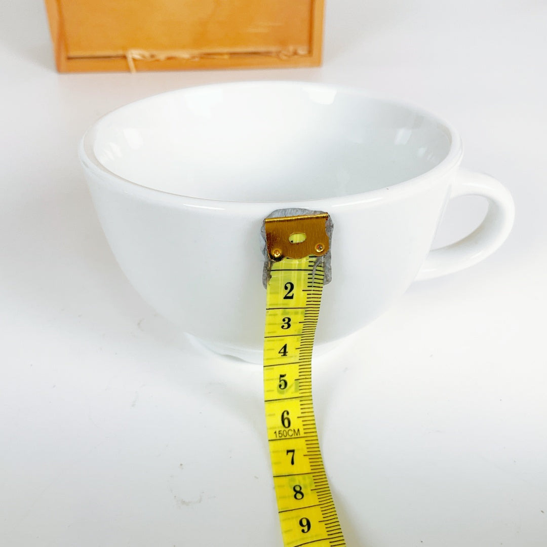 Penguin Books (NZ) Ltd 25th Anniversary Commemorative Porcelain Cup