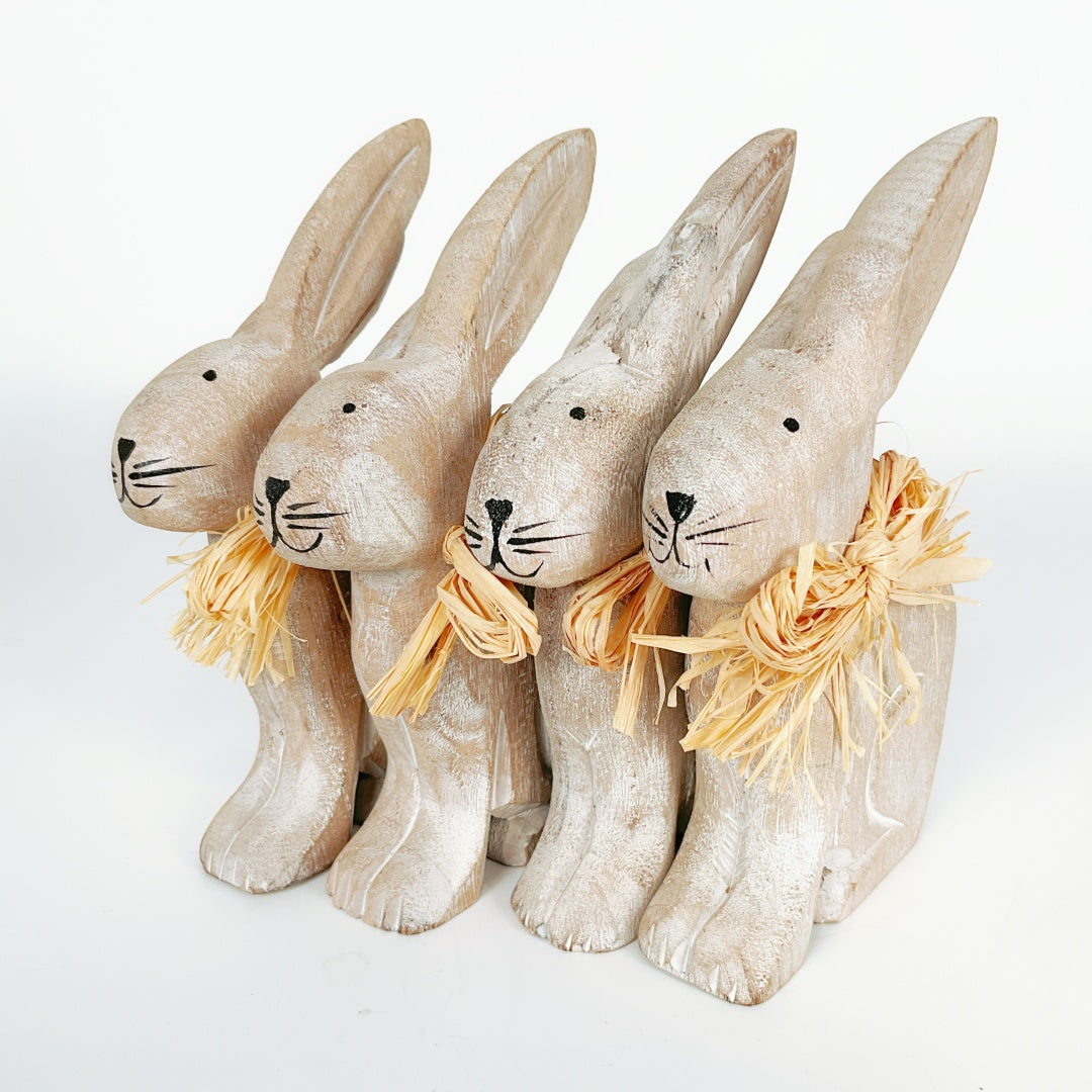 Set of Four Hand-Carved Wooden Bunnies