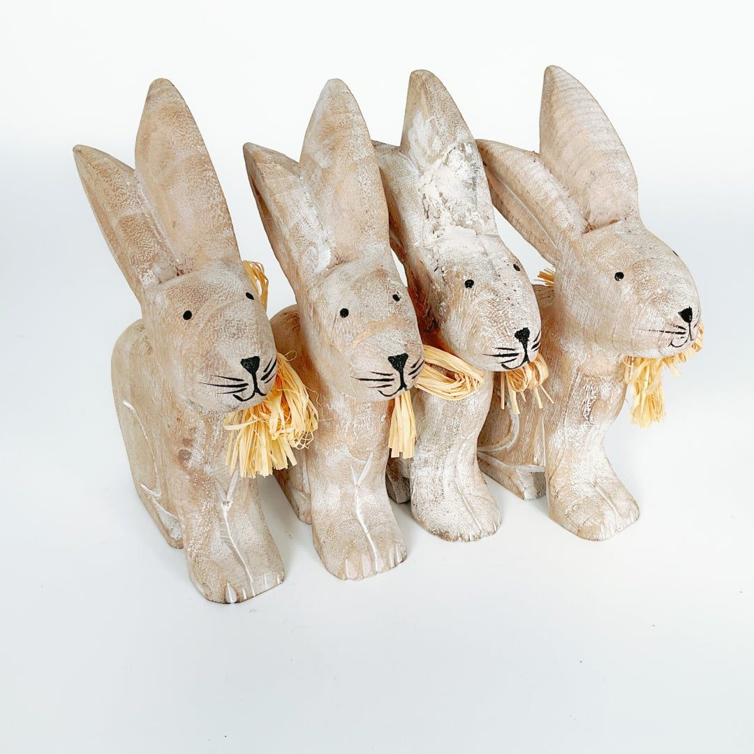 Set of Four Hand-Carved Wooden Bunnies