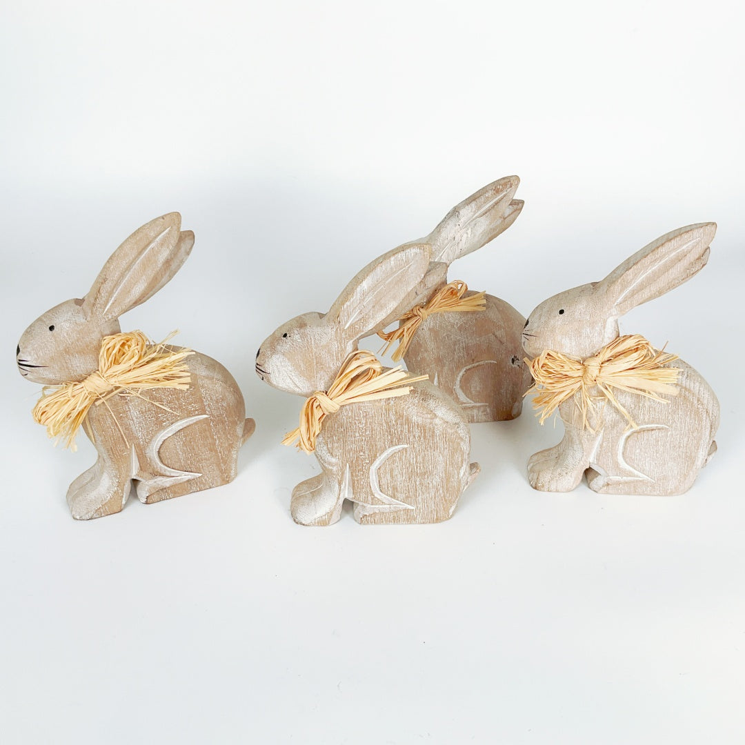 Set of Four Hand-Carved Wooden Bunnies