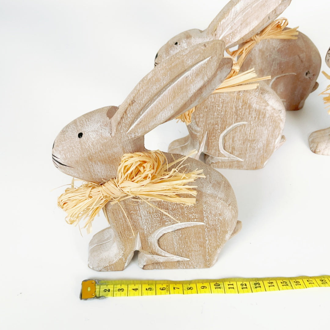 Set of Four Hand-Carved Wooden Bunnies