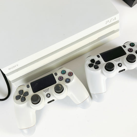 SONY PS4 Pro 1TB Console Bundle (Two contronllers - Glacier White)